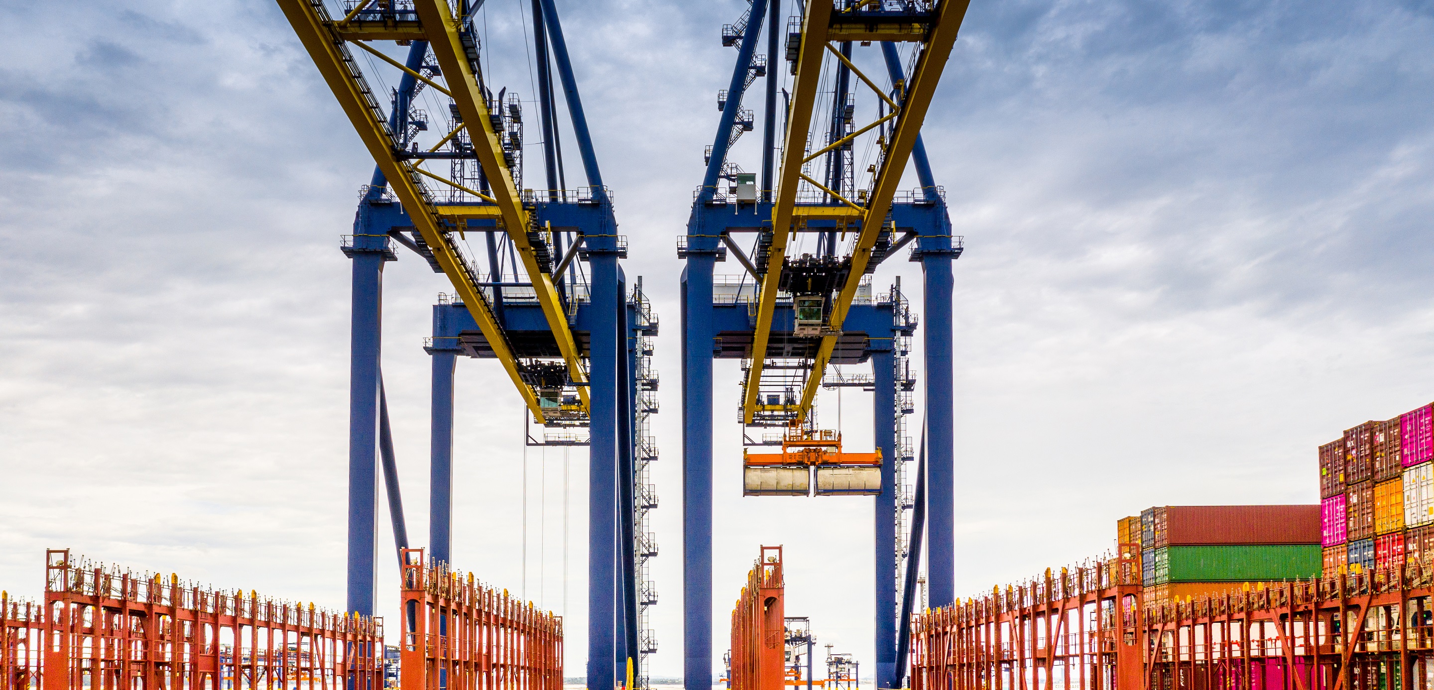 unloading crane in cargo ship terminal